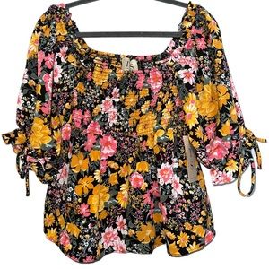 Anthropologie Twine and String Floral smocked puff sleeve blouse